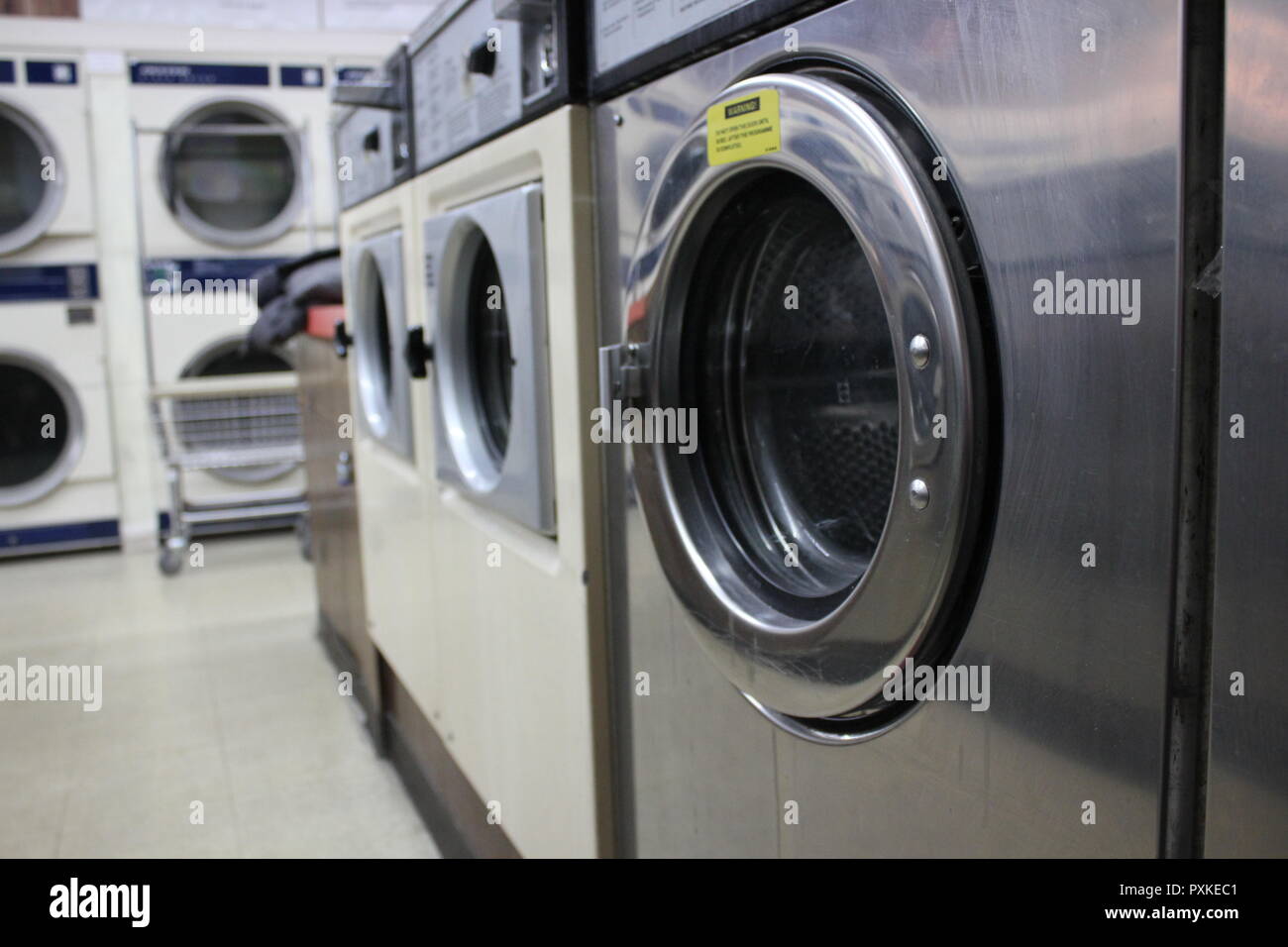 Washing Machines And Dryers At The Local Laundromat That Still Has