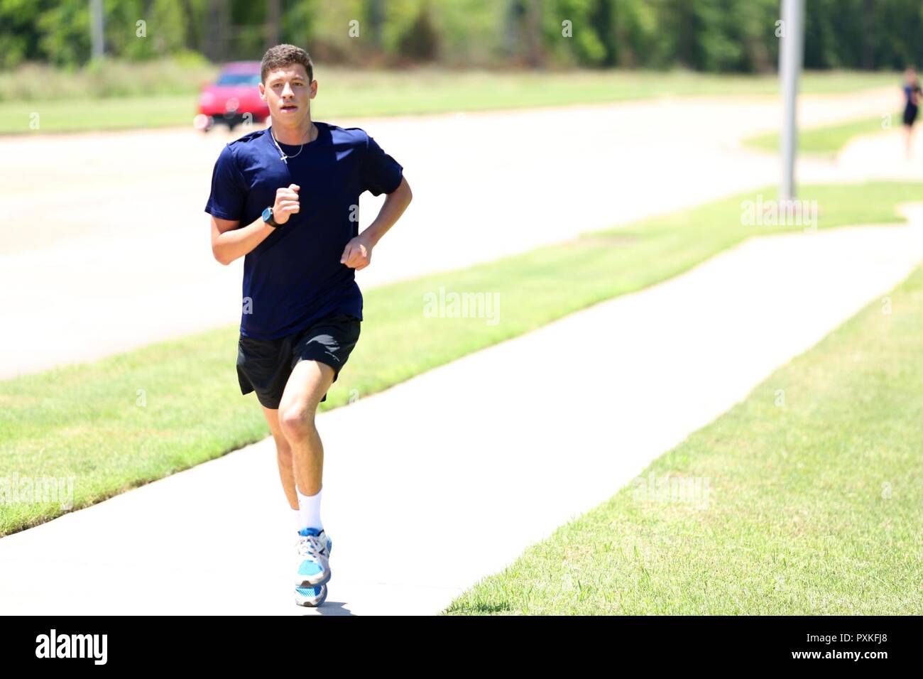 SHREVEPORT, LA – (June 8, 2017) Future Sailor David Morgan from Bossier City, LA, finishes first in the 1.5-mile run during the final event of the physical screening test (PST) conducted by Navy Recruiting District Houston’s Special Warfare (SPECWAR) Scout Team in Shreveport, LA, Thurs., June 8. More than 40 applicants participated in the PST. Their results will be placed into a national draft where the top performers will be selected to start SPECWAR training in their selected community – the Navy SEAL Teams, Special Warfare Combatant-Crew (SWCC), Explosive Ordnance Disposal (EOD), Navy Diver Stock Photo