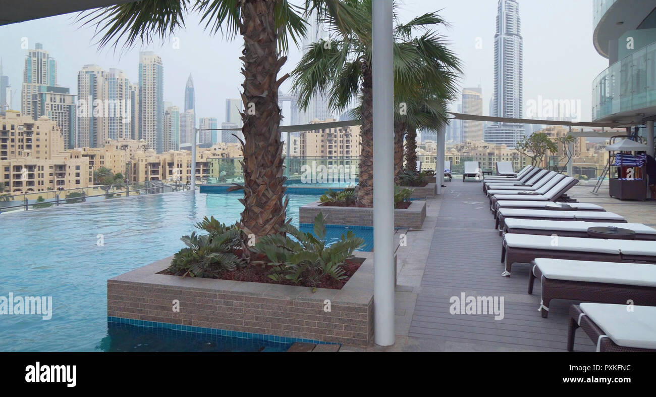 Outdoor pool with beautiful views of downtown Dubai in Damac Maison Dubai Mall Street Stock Photo