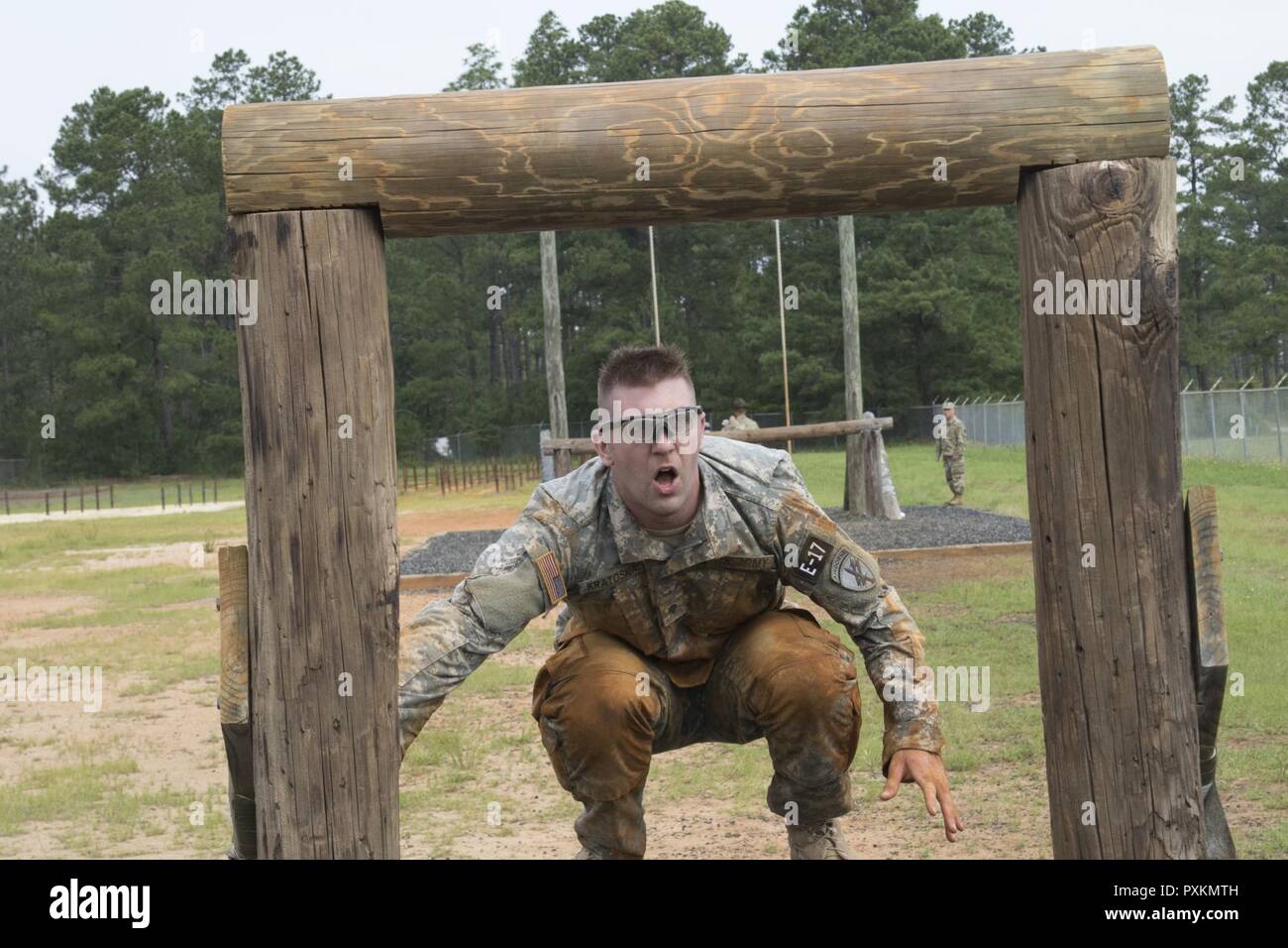 Pfc. Robert Kratoska a psychological operations specialist representing the U.S. Army Civil Affairs & Psychological Operations Command (Airborne), competes in Air Assault Course at the 2017 U.S. Army Reserve Best Warrior Competition at Fort Bragg, N.C. June 13. This year’s Best Warrior Competition will determine the top noncommissioned officer and junior enlisted Soldier who will represent the U.S. Army Reserve in the Department of the Army Best Warrior Competition later this year at Fort A.P. Hill, Va. Stock Photo