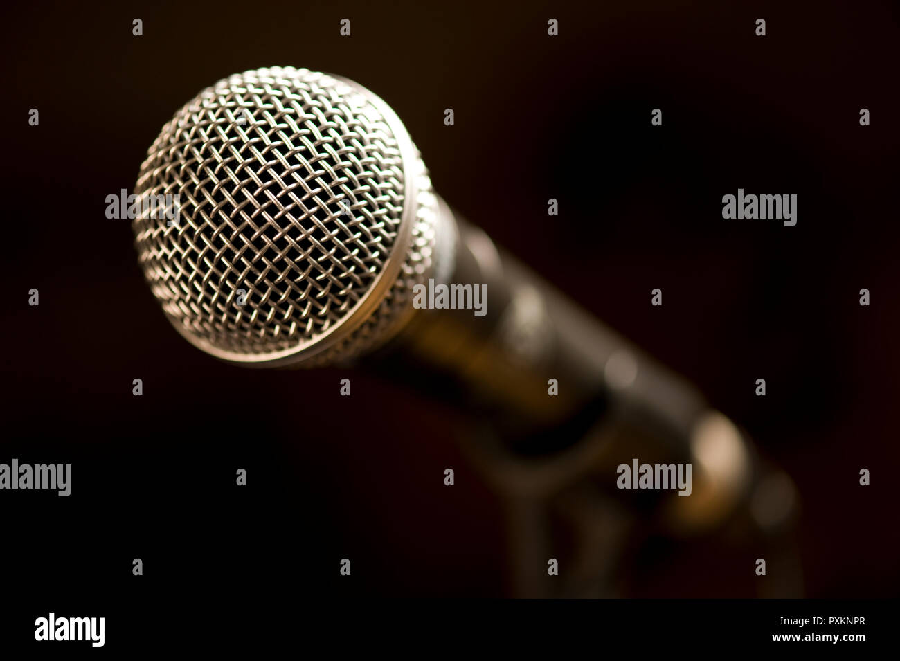 A microphone in a stand Stock Photo