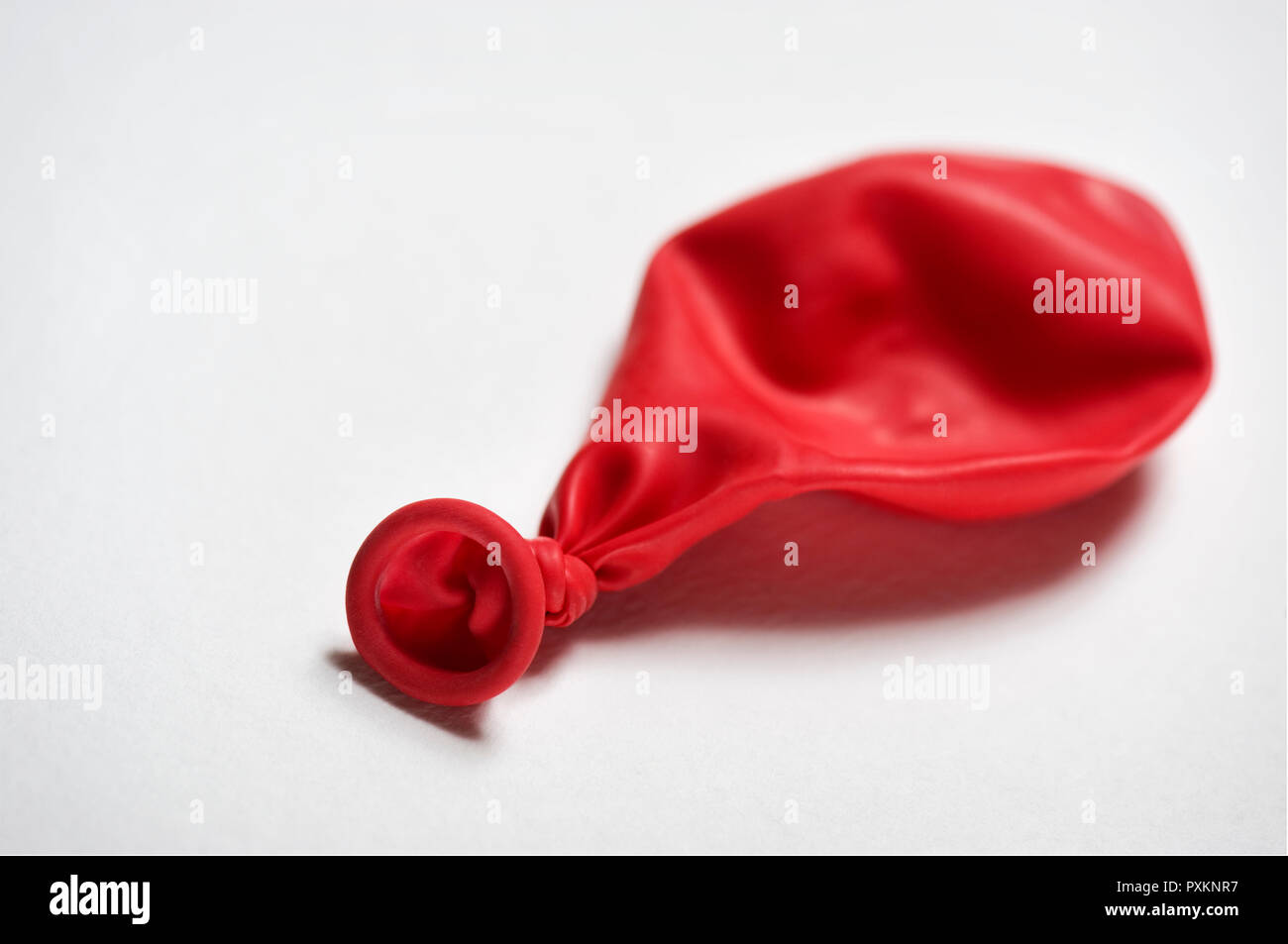 A red balloon on a white background Stock Photo