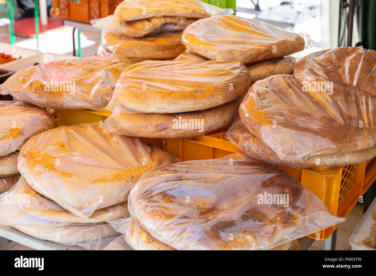 Packed flatbreads for sale at a market stall in Germany Stock Photo