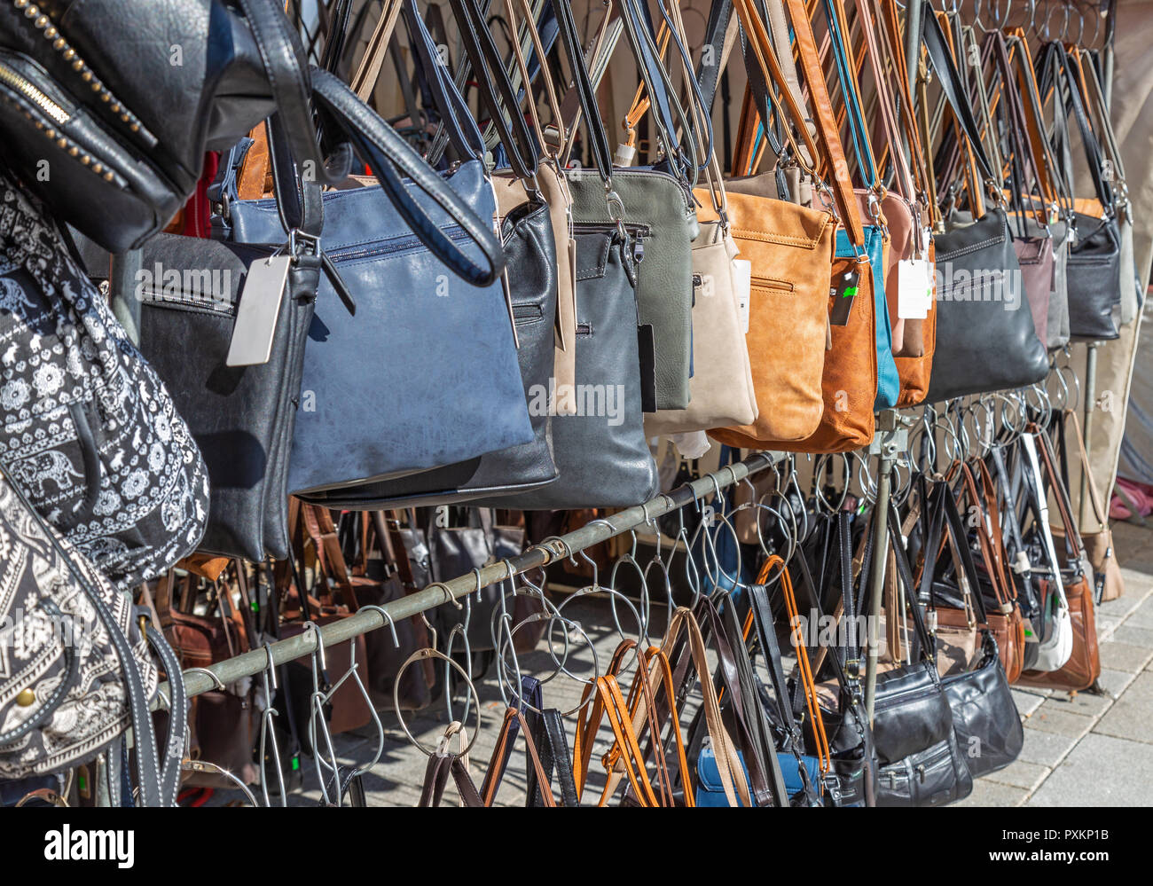 Pile of used worn secondhand bags handbags for sale Stock Photo - Alamy