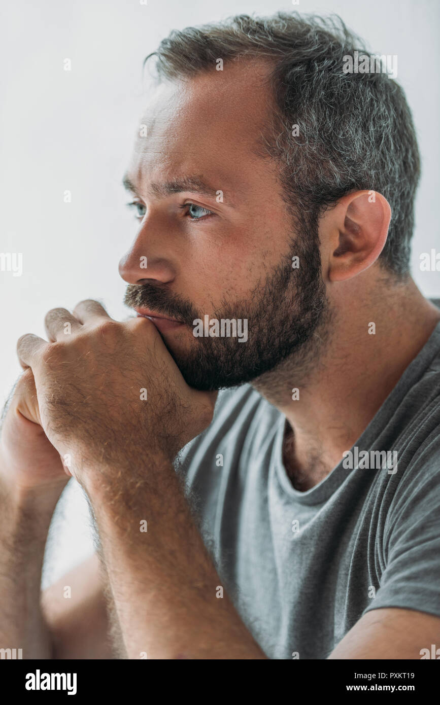 Side Profile Of A Sad Man With Hands On Face Looking Down. Depression And  Anxiety Disorder Concept Stock Photo, Picture and Royalty Free Image. Image  89272898.