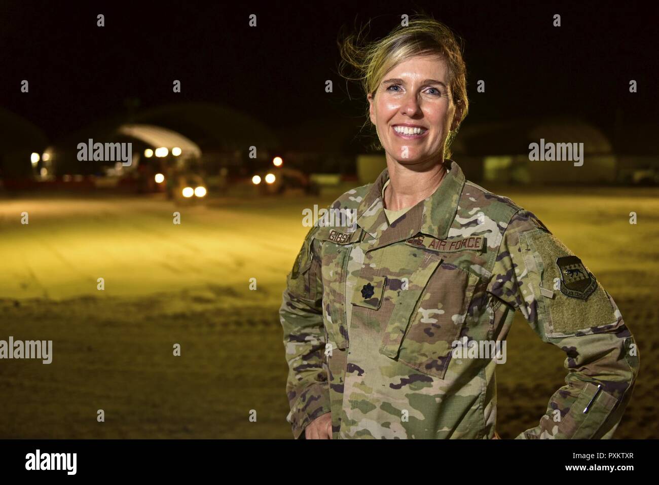 Lt. Col. Heidi Gibson, 407th Expeditionary Civil Engineer Squadron commander, poses for a photo June 7, 2017, at the 407th Air Expeditionary Group in Southwest Asia. Gibson enlisted in the California Air National Guard in 1986 then later commissioned. She has had success in her civilian and military career, holding the titles of principal in her very own architecture firm and field grade officer with the Air National Guard as the 163rd Civil Engineer Squadron commander at March Air Reserve Base, Calif. Stock Photo