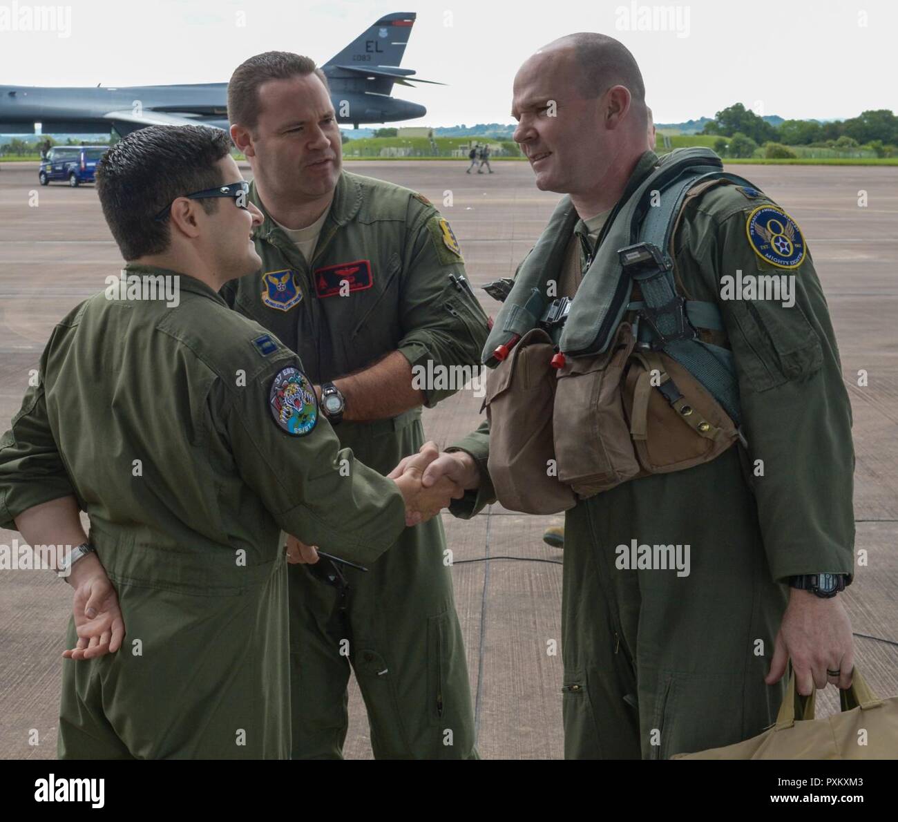 U.S. Air Force Lt. Col. Nate Barrett, right, a 37th Bomb Squadron weapons system operator, is