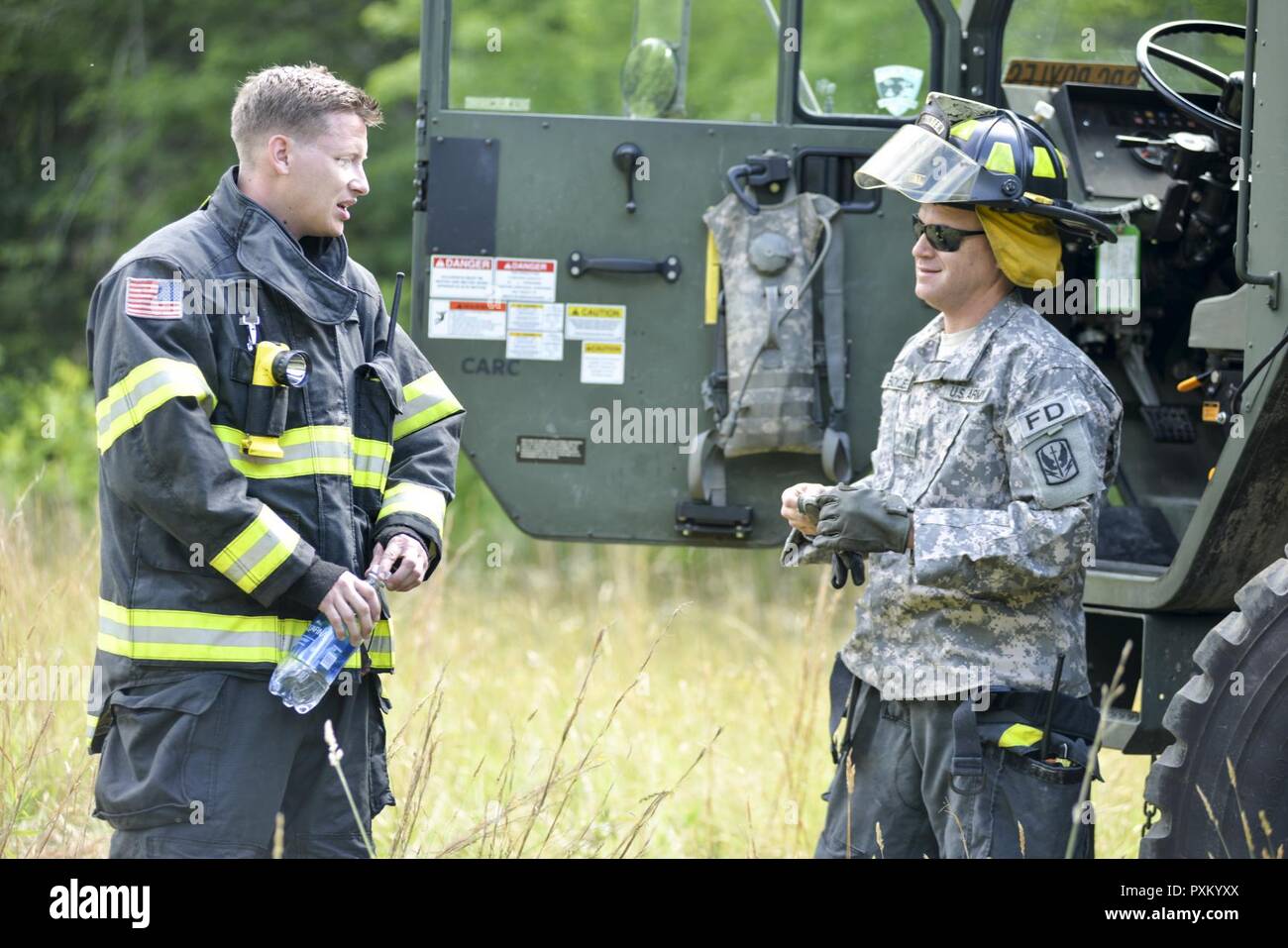 North Carolina National Guard firefighters Spc. Jason Fortier and Spc