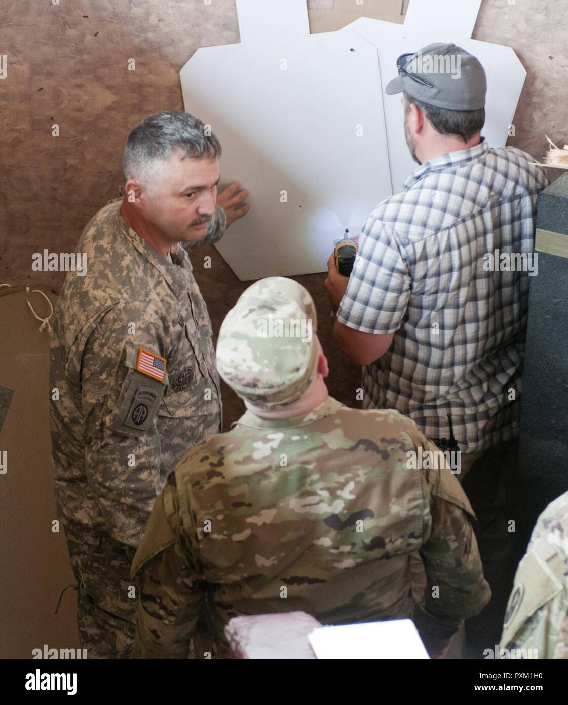 Sgt. 1st Class Casey Martin (left), of the U.S. Army Reserve Command ...