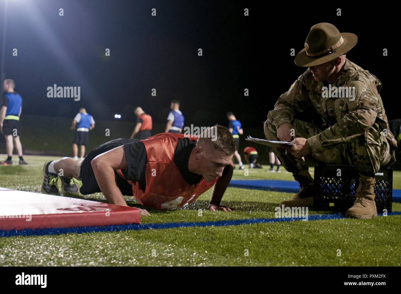 A Warrior conducts pushups during the Army Physical Fitnes Test during