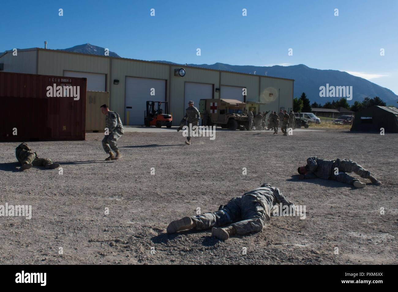 U.S. Army Reservists with the 96th Sustainment Brigade run toward ...