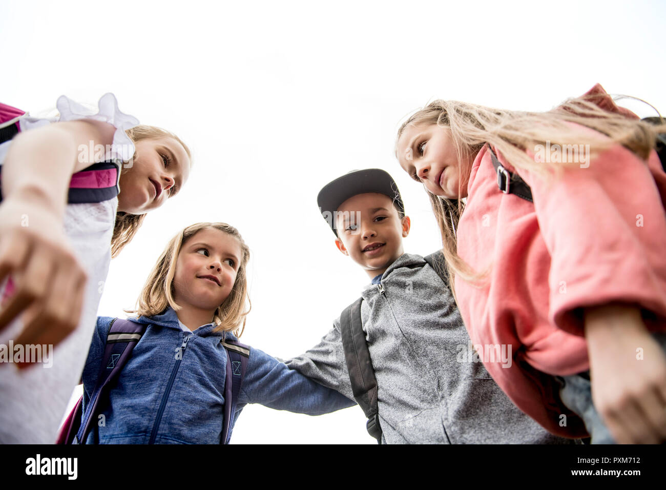 Group of students outside at school standing together Stock Photo - Alamy