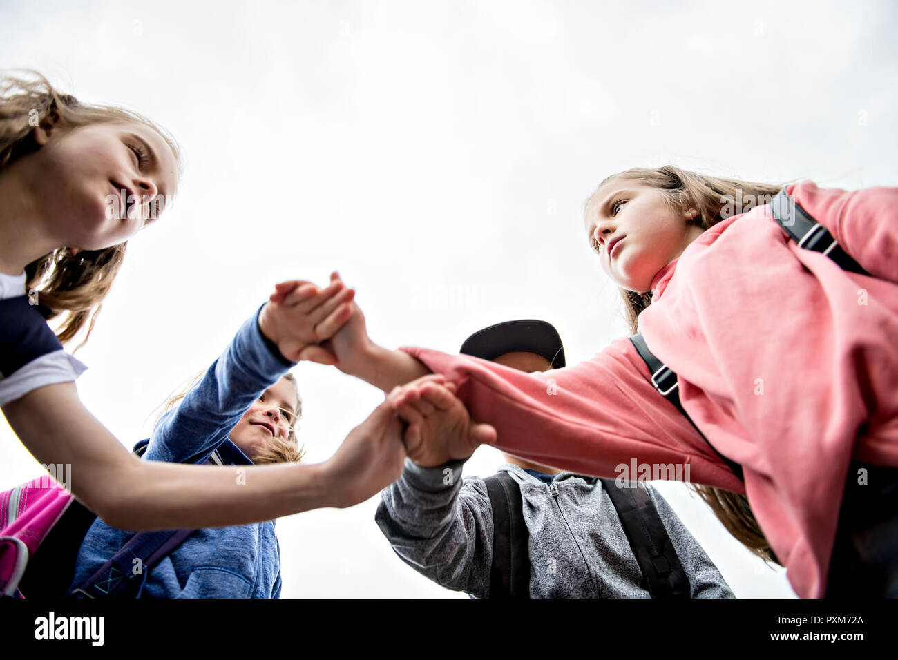 Group of students outside at school standing together Stock Photo - Alamy