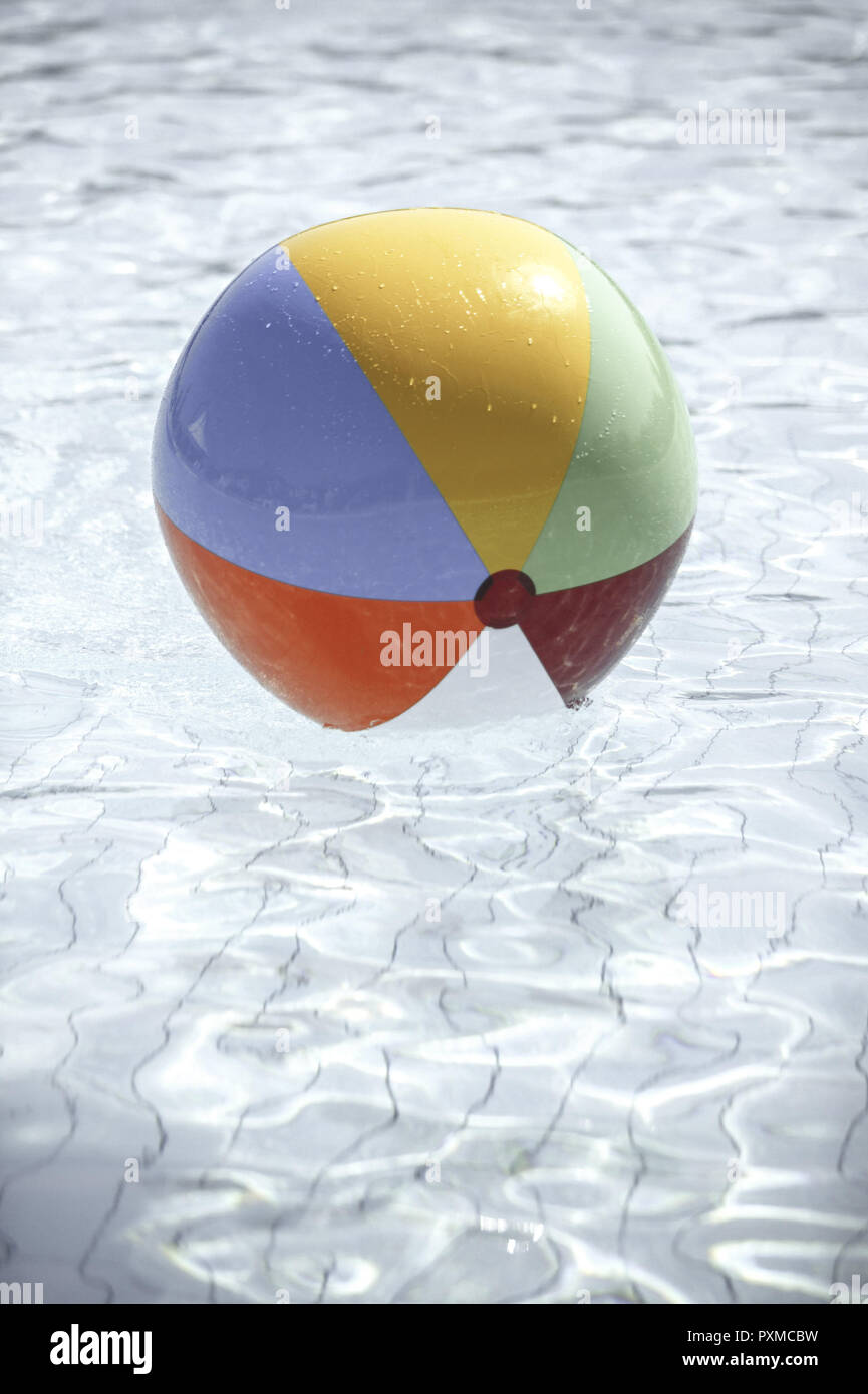 coloured beach ball in the pool Stock Photo Alamy