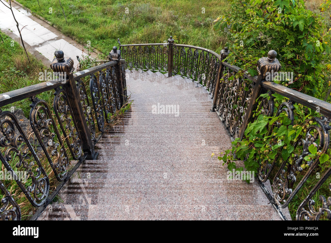 Marble staircase in green park Stock Photo