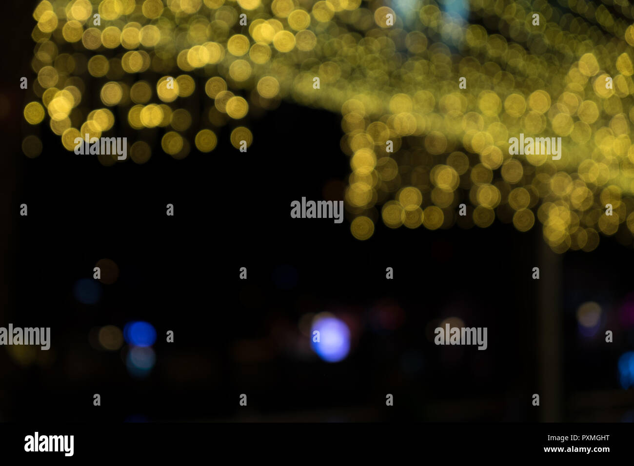 Abstract gold bokeh on the black background Stock Photo - Alamy