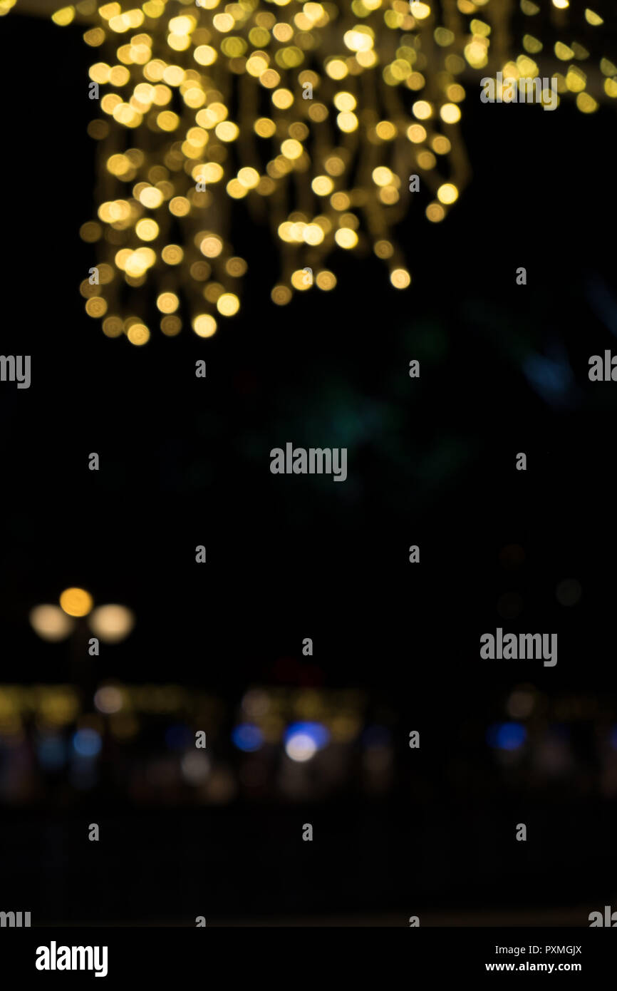 Abstract gold bokeh on the black background Stock Photo - Alamy