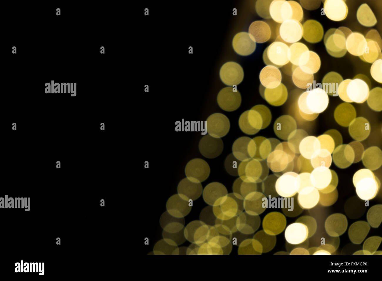 Abstract gold bokeh on the black background Stock Photo - Alamy