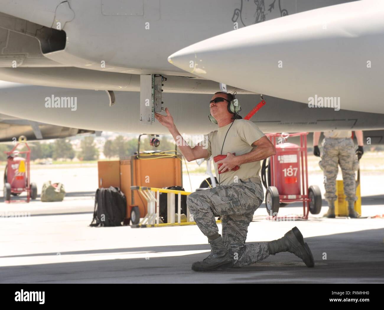 Oregon Air National Guard Master Sgt. Joe Wright prcoess an F-15 Eagle ...
