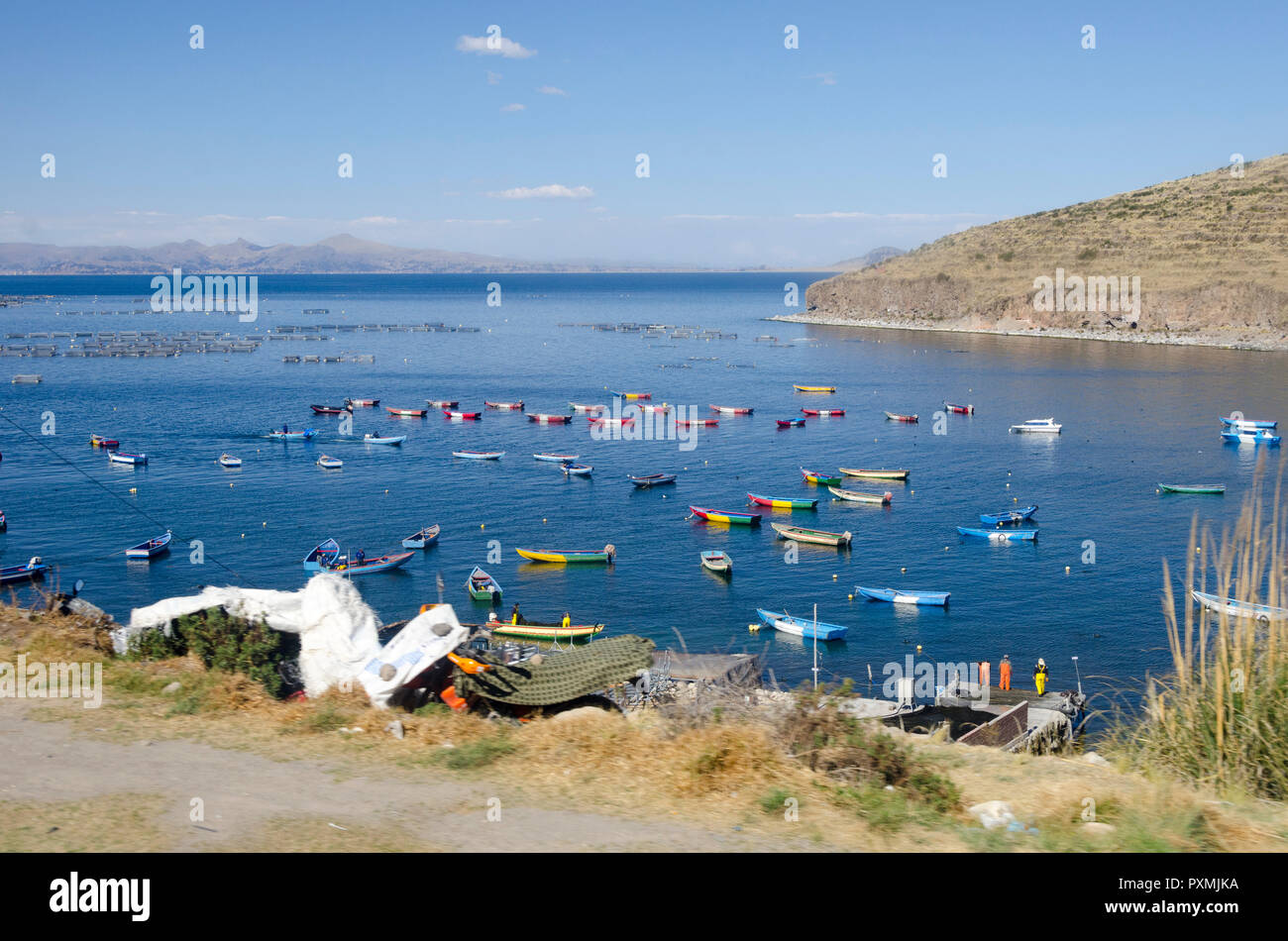 Fishing boats in bay, Pomata, near Puno, Lake Titicaca, Peru Stock Photo