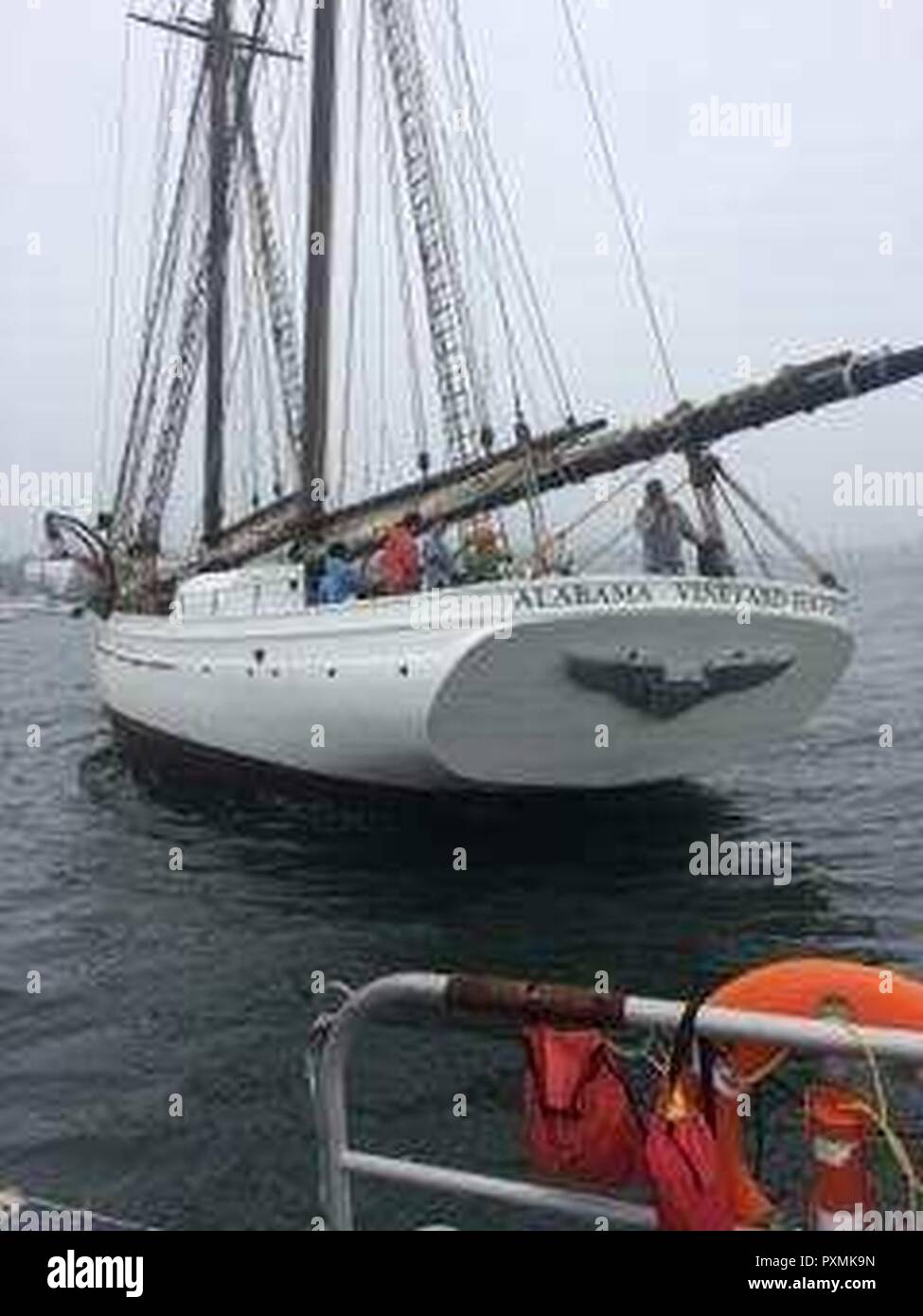 A Coast Guard Station New London boatcrew safely transferred 17 passengers from a grounded Schooner near the mouth of the Mystic River, Connecticut, Sunday evening. The Station boatcrew arrived on scene and safely transferred the 17 passengers from the 126-foot Schooner, Alabama, to Noank shipyard in Groton, Conn. Stock Photo