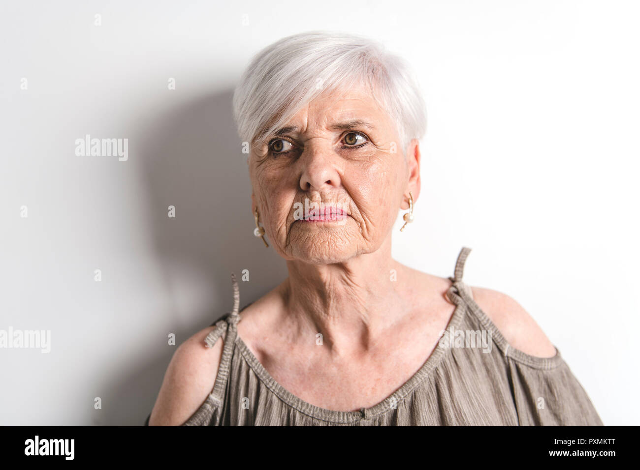 hard portrait Of Senior Woman Stock Photo