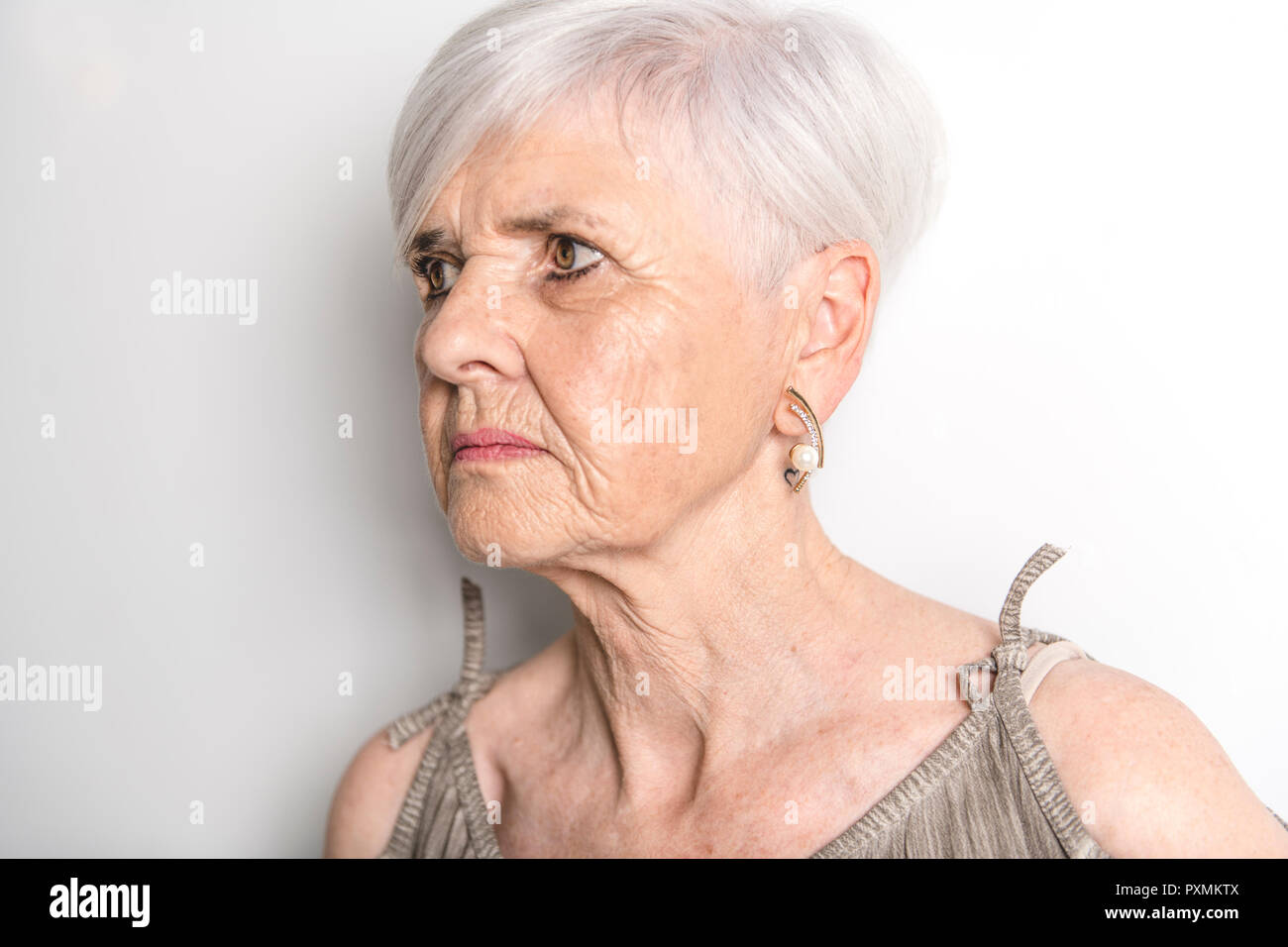 hard portrait Of Senior Woman Stock Photo