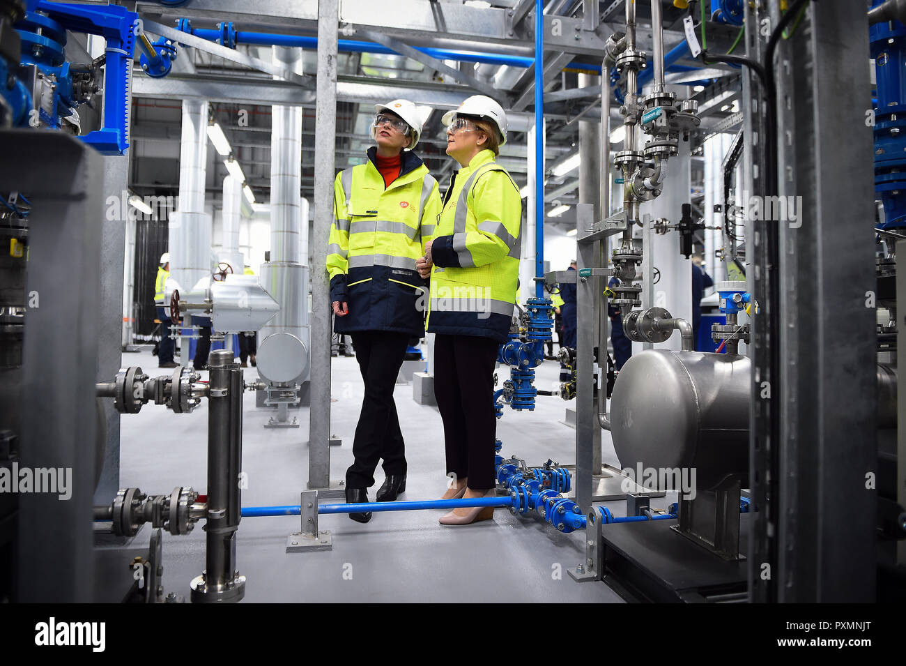 First Minister Nicola Sturgeon (right) talks with GlaxoSmithKline's (GSK) new CEO Emma Walmsley, during a visit to GSK in Montrose, Scotland, where she officially opened the new production building. Stock Photo