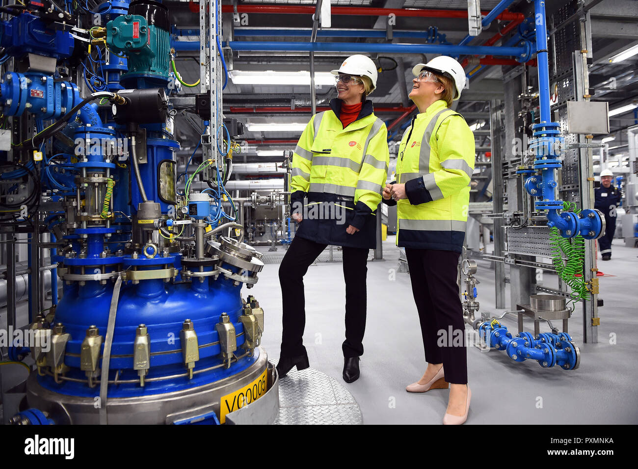 First Minister Nicola Sturgeon (right) talks with GlaxoSmithKline's (GSK) new CEO Emma Walmsley, during a visit to GSK in Montrose, Scotland, where she officially opened the new production building. Stock Photo