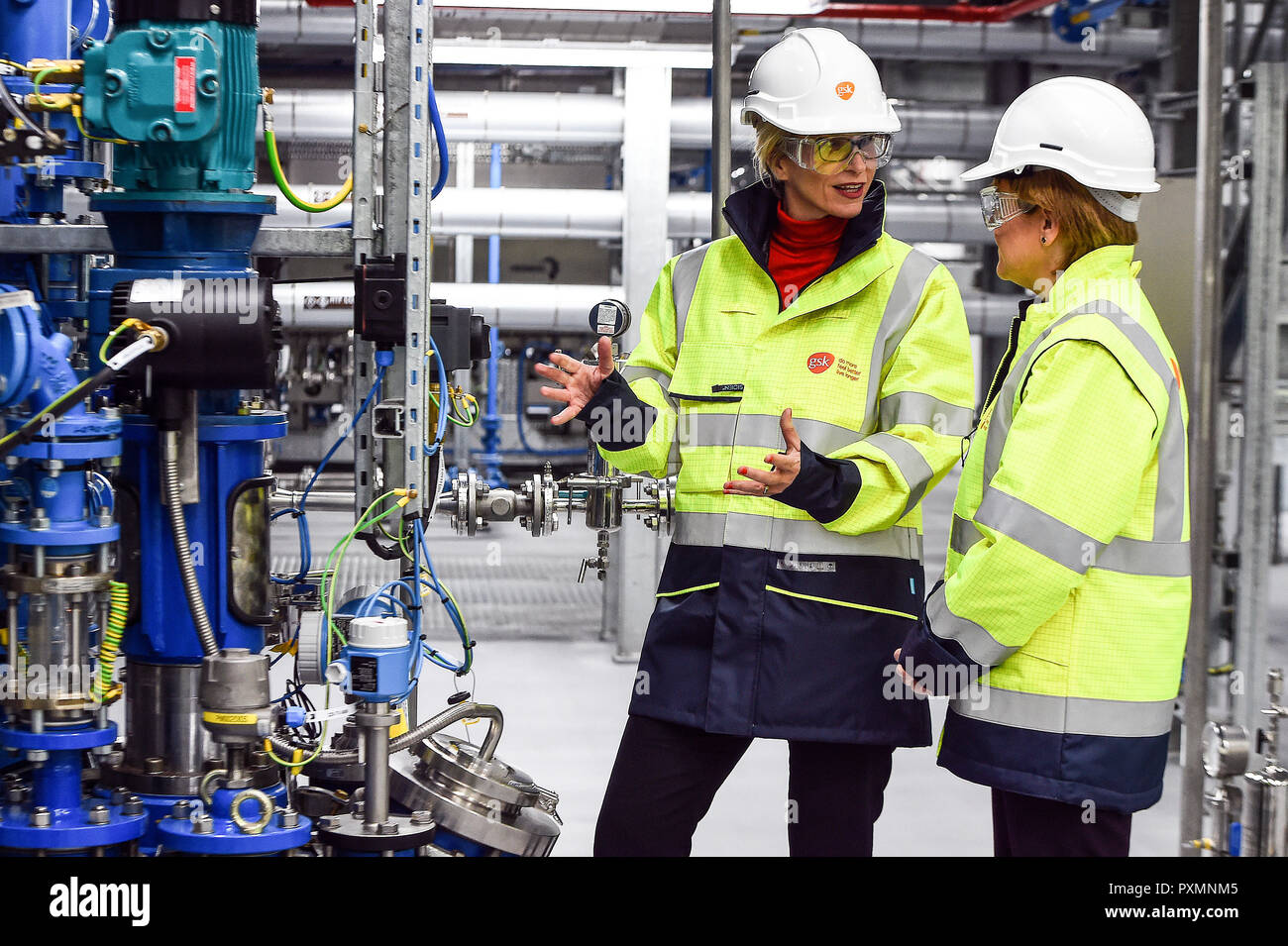 First Minister Nicola Sturgeon (right) talks with GlaxoSmithKline's (GSK) new CEO Emma Walmsley, during a visit to GSK in Montrose, Scotland, where she officially opened the new production building. Stock Photo