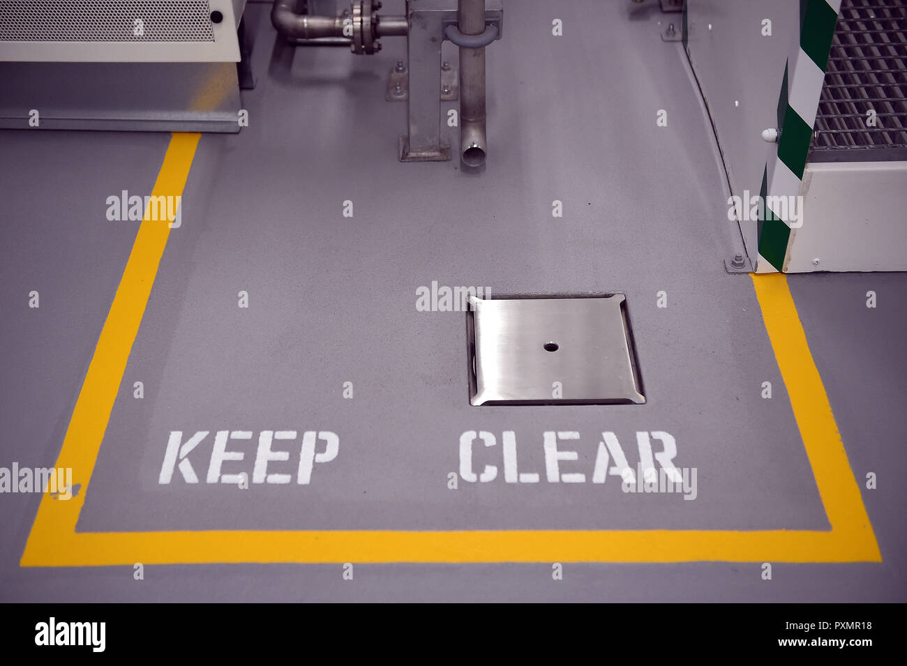 A safety sign painted on the floor of the new GlaxoSmithKline (GSK