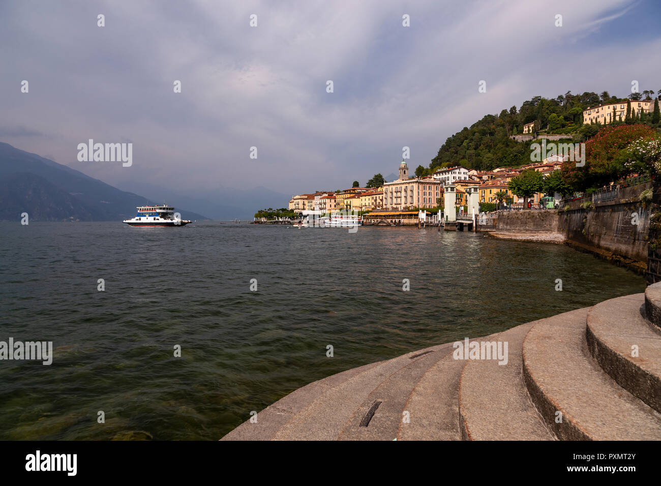 Stone steps and ferry at Bellagio on Lake Como, Italy Stock Photo