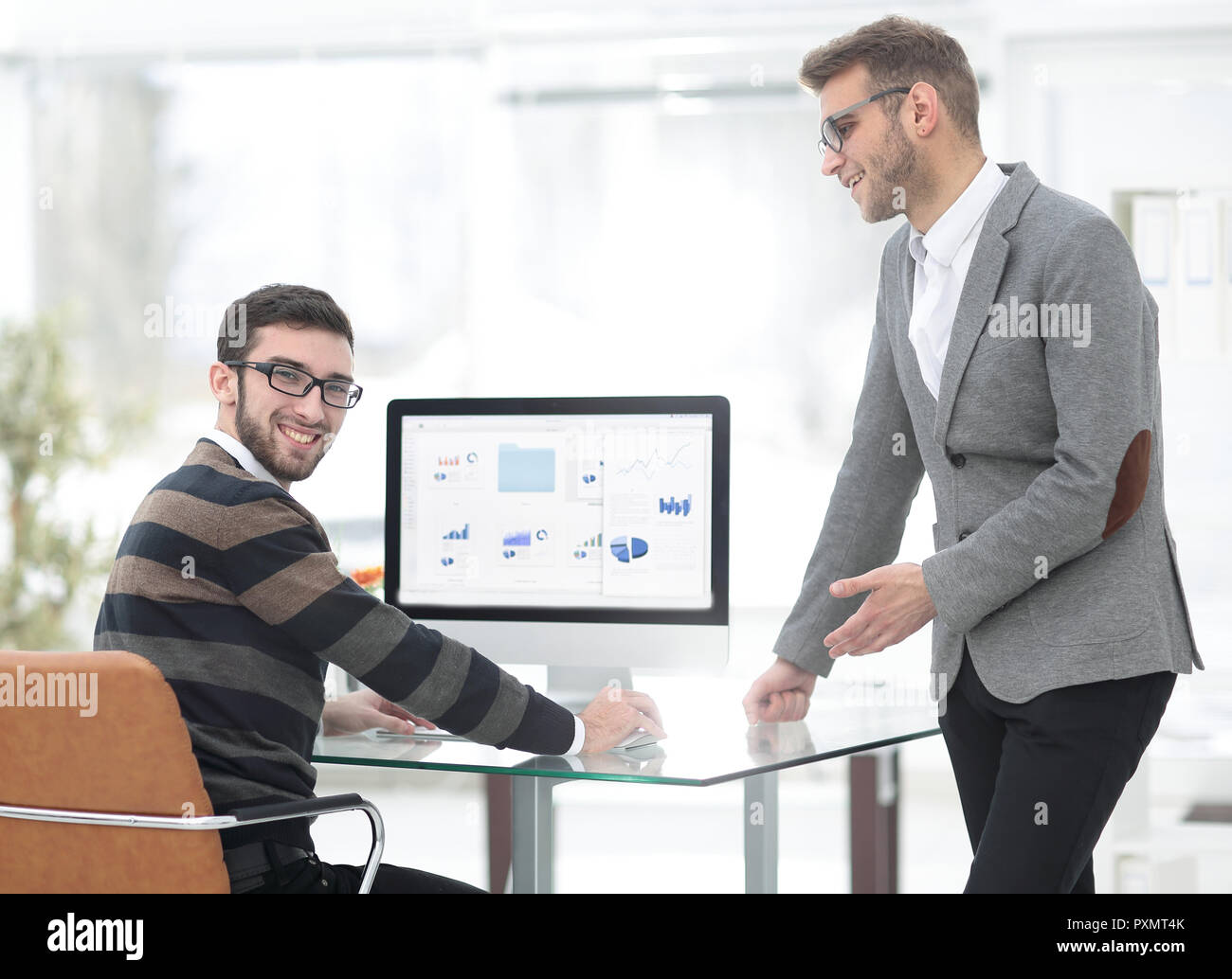 two businessmen analyzing stats financial data Stock Photo