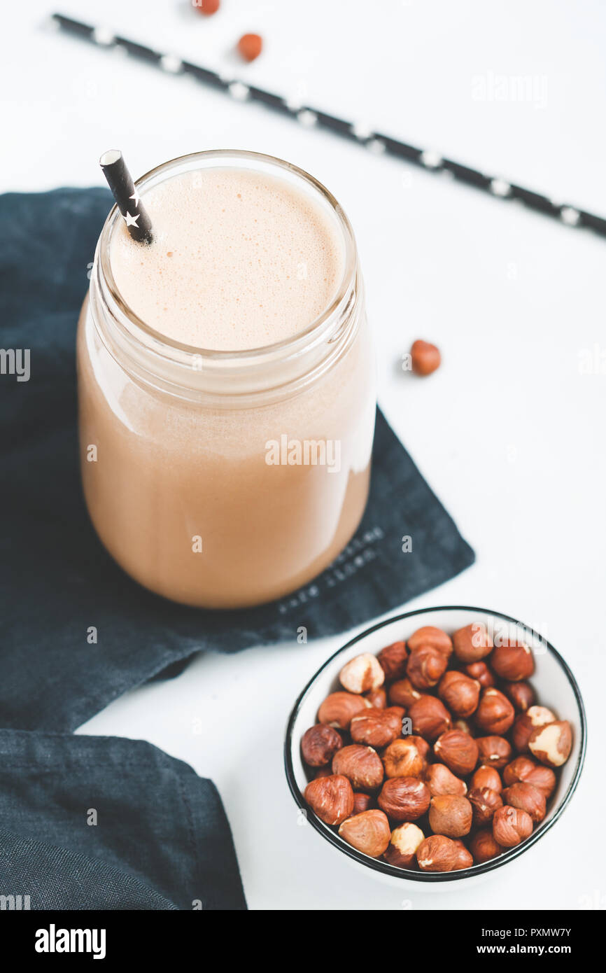 Download Nut Butter Chocolate Protein Shake In A Glass Jar The Concept Of A Healthy Lifestyle And Fitness Diet Stock Photo Alamy Yellowimages Mockups