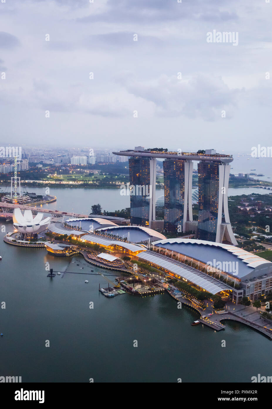 Aerial view of Singapore Marina Bay in the evening twilight Stock Photo