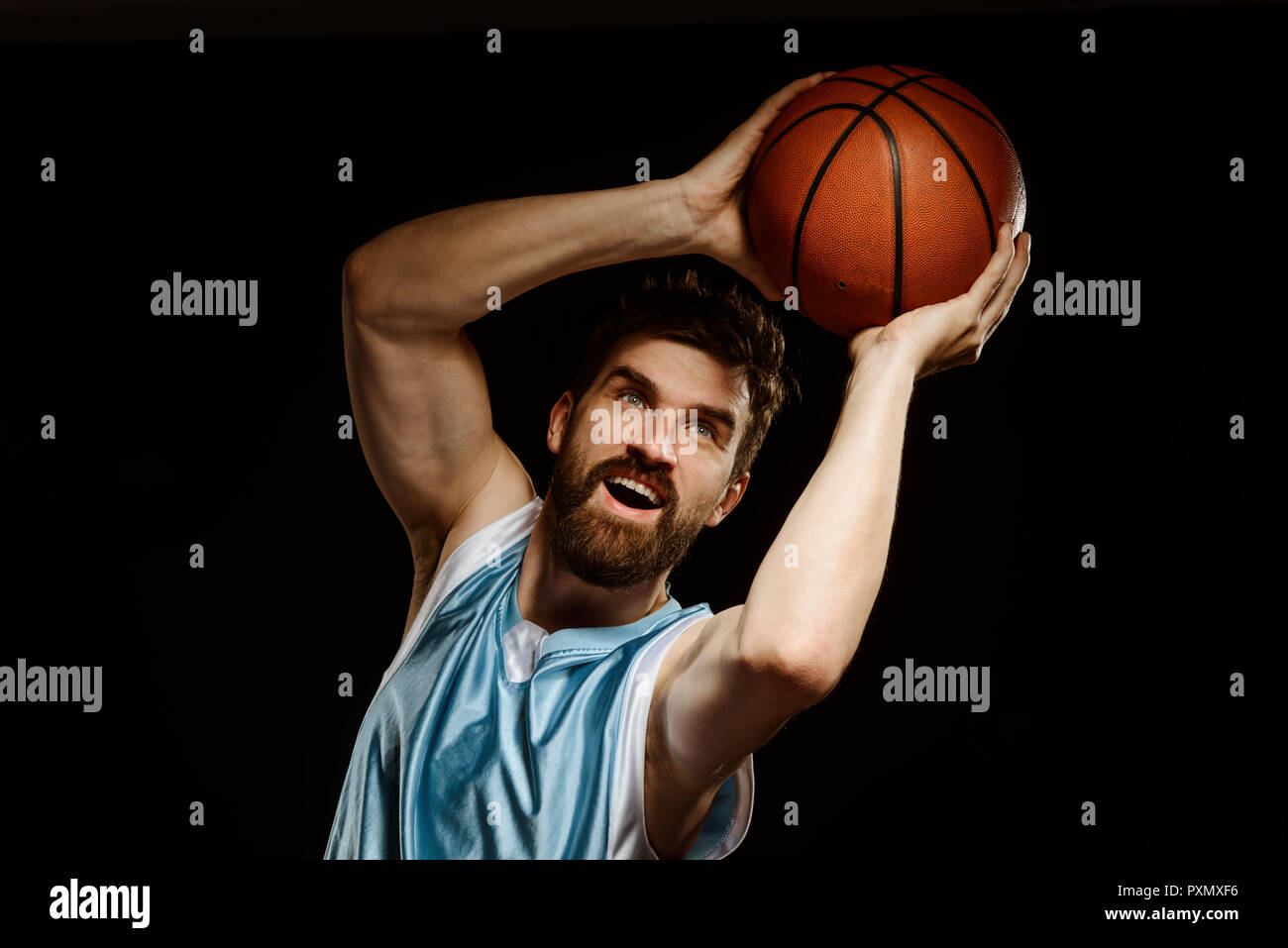 Player makes an overhead pass Stock Photo