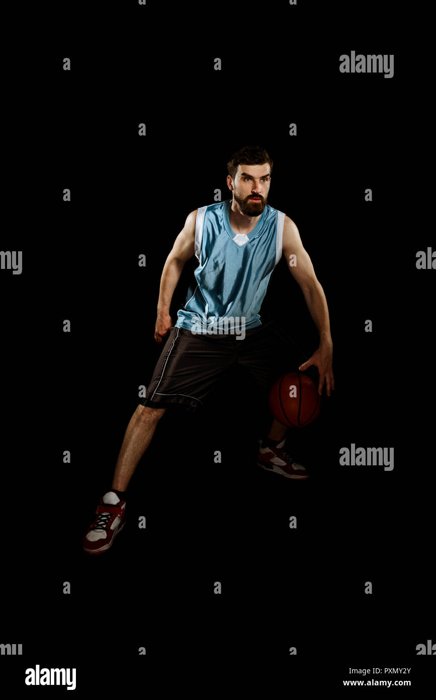 Man dribbling ball between legs Stock Photo Alamy