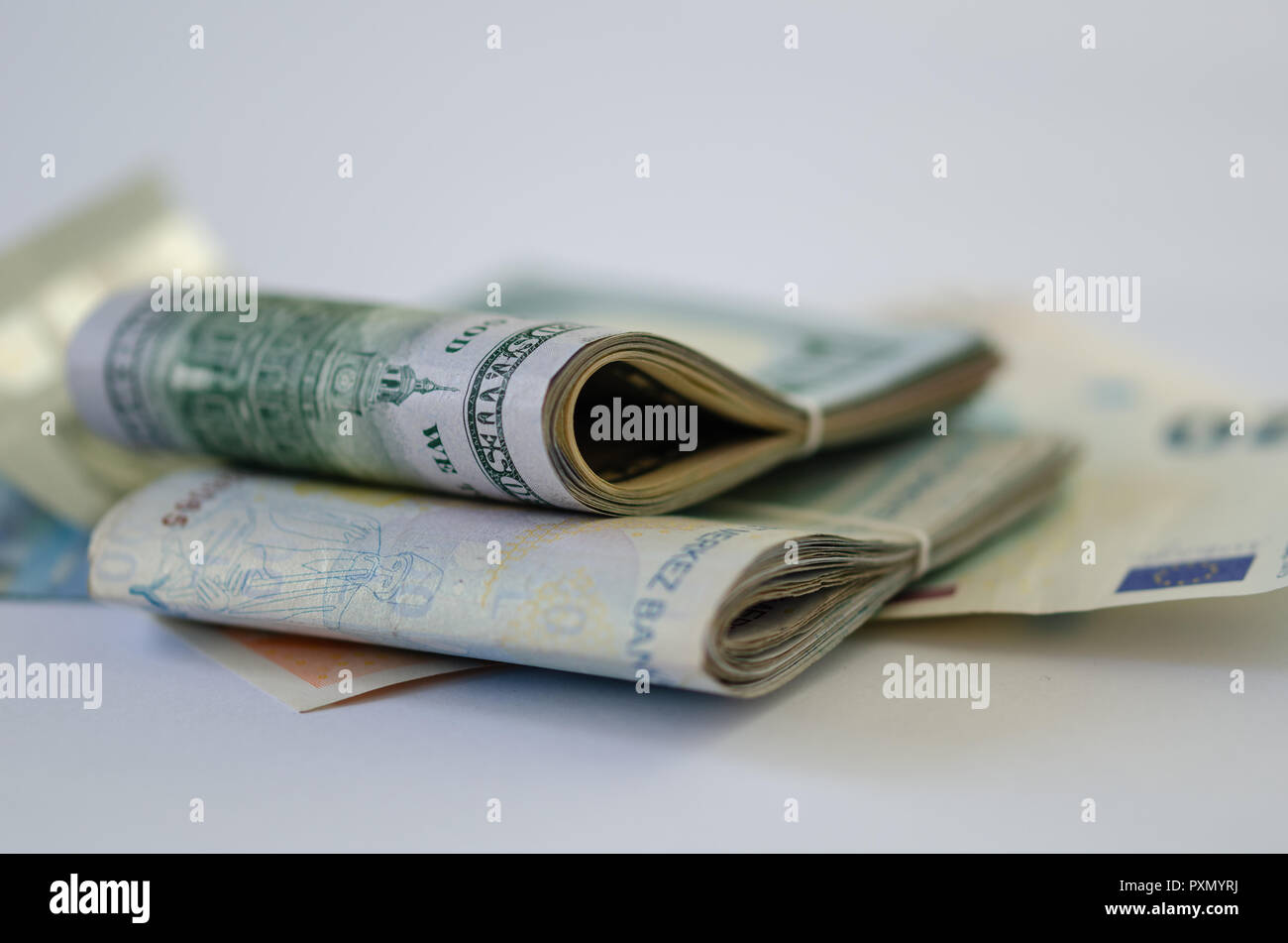 There are dolar,euro and liras banknotes on the white background. Saving money concept. Stock Photo