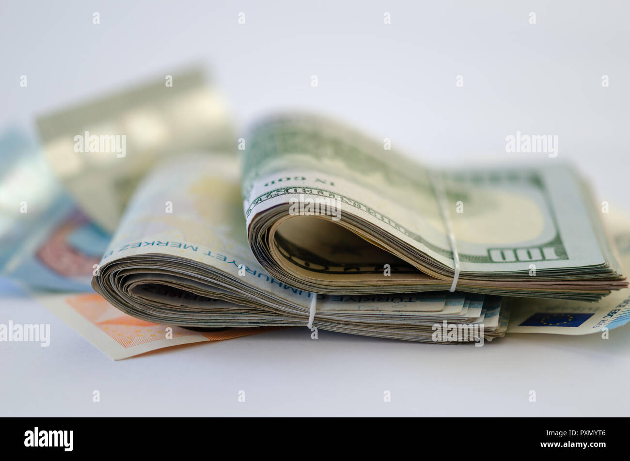 There are dolar,euro and liras banknotes on the white background. Saving money concept. Stock Photo