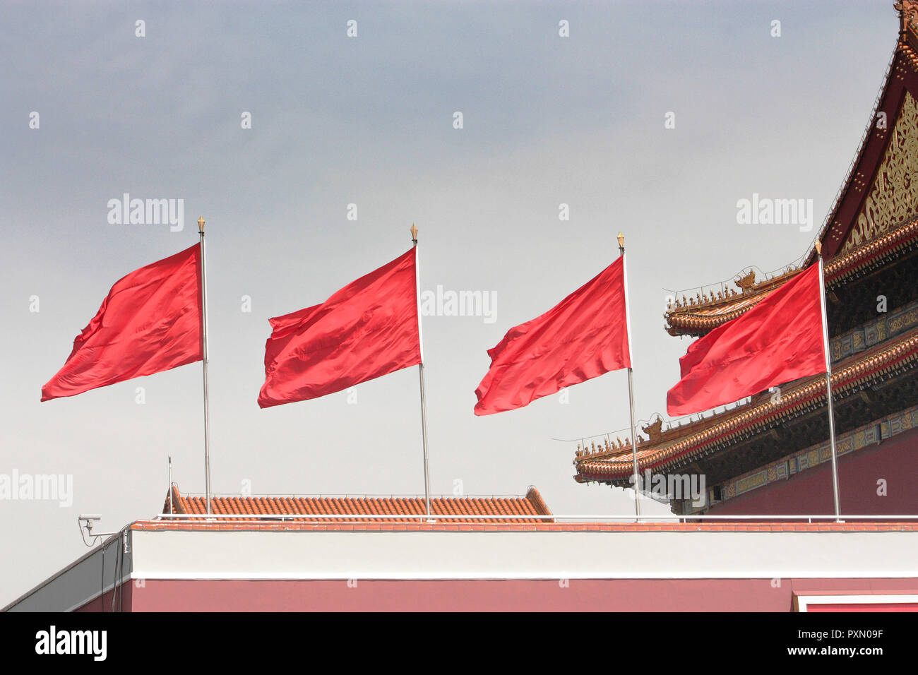 Four red flags flying over The Forbidden City, Tiananmen Square, Beijing, China Stock Photo