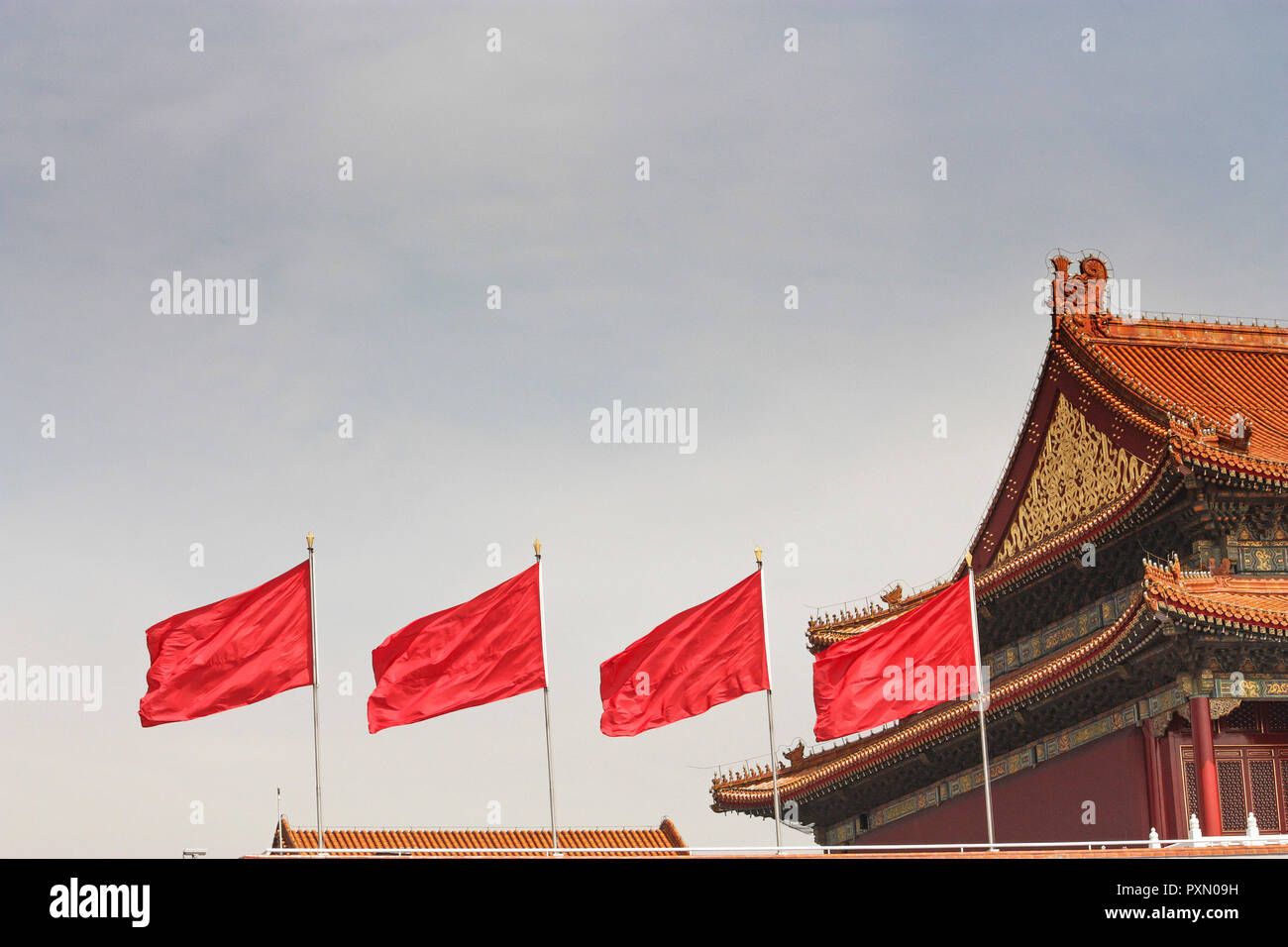 Four red flags flying over The Forbidden City, Tiananmen Square, Beijing, China Stock Photo
