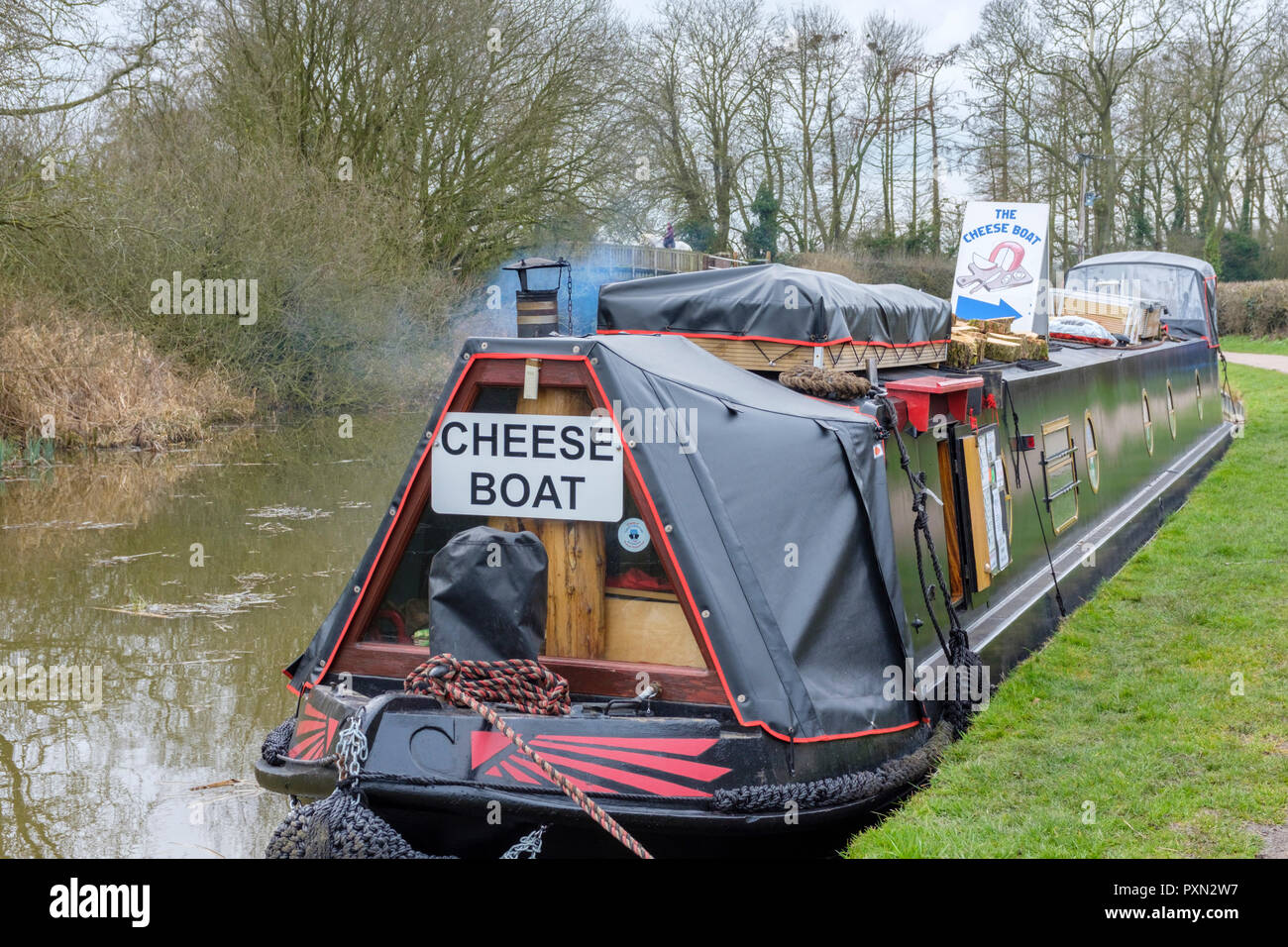 Canal narrowboat selling cheese, moored on the Grand Union Canal