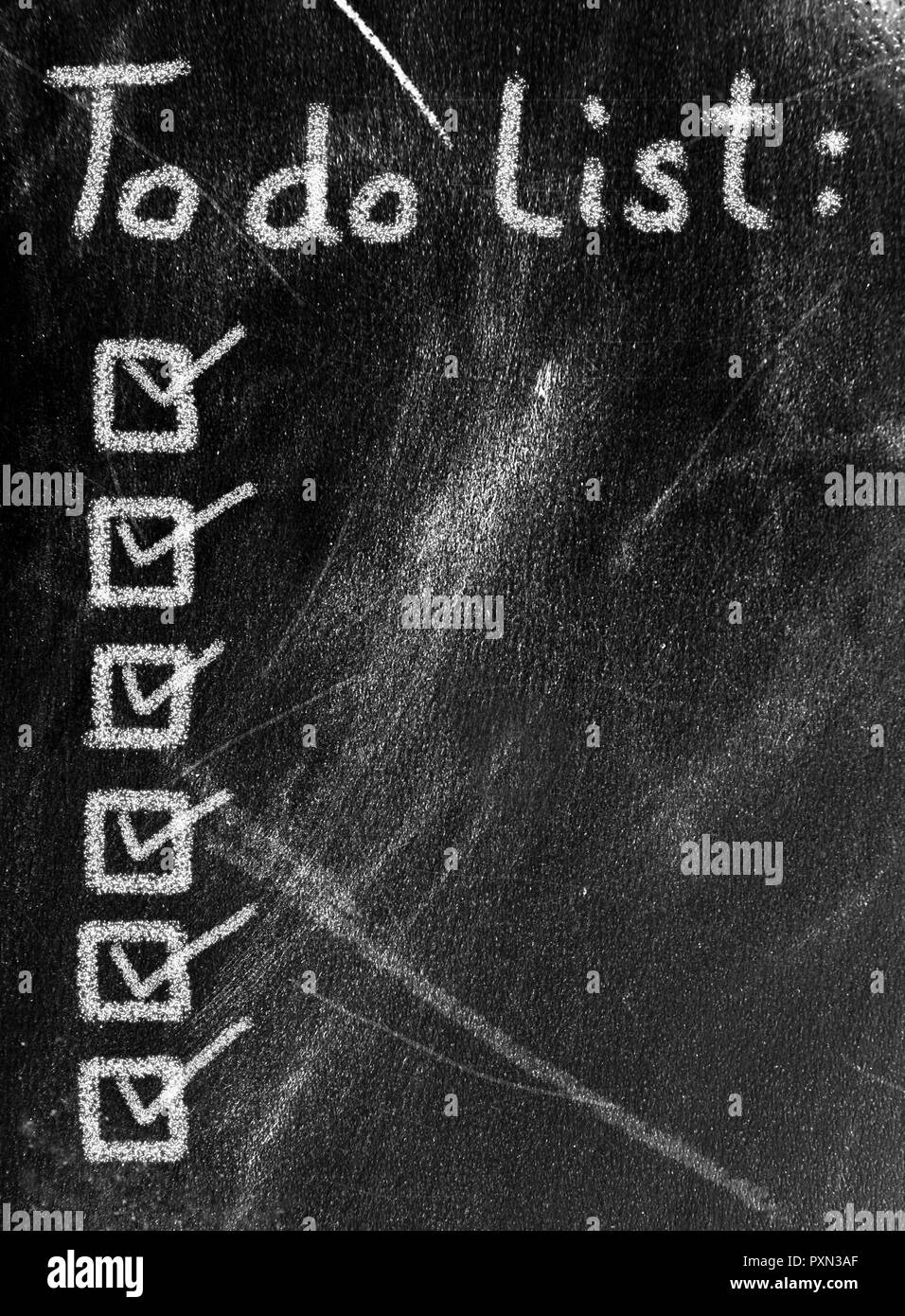 Chalkboard drawing check list concept Black and White Stock Photos