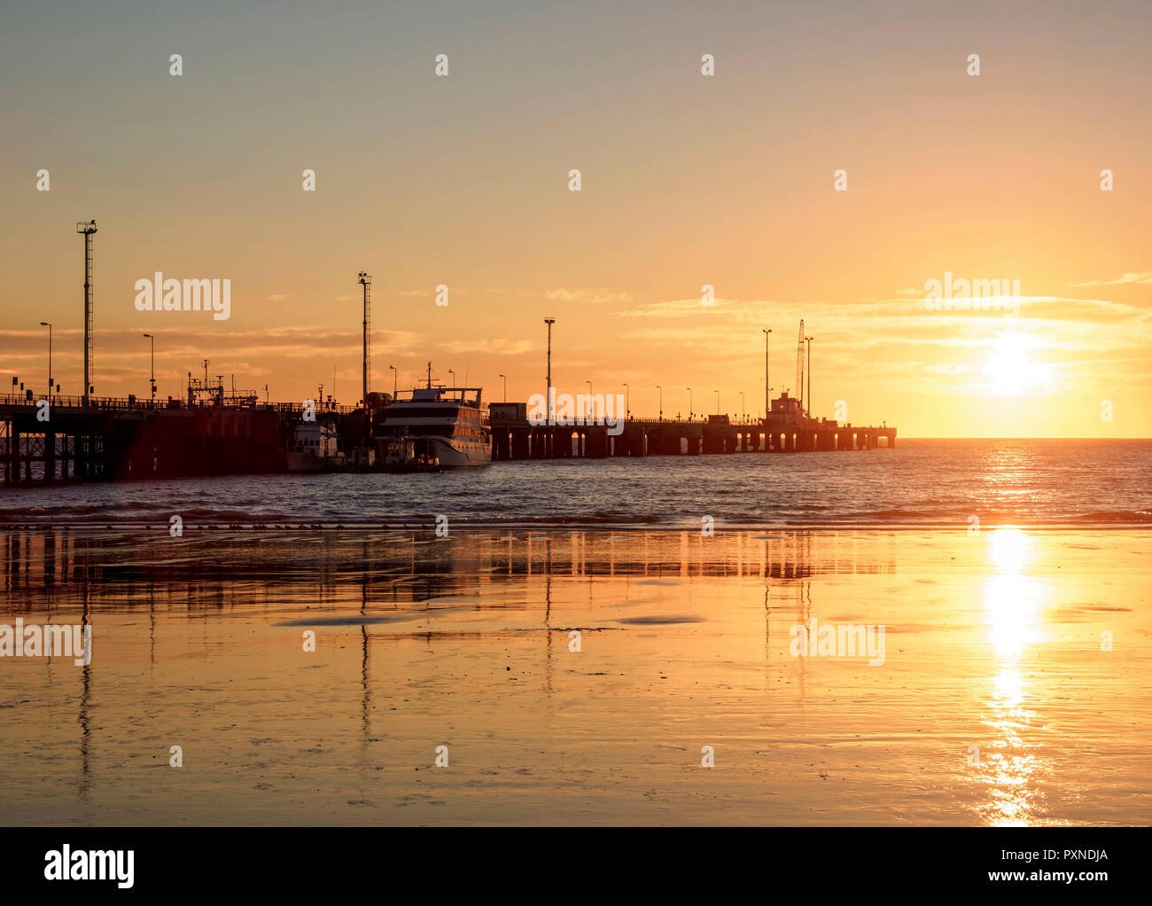 Comendante Luis Piedrabuena Pier at sunrise, Puerto Madryn, The Welsh Settlement, Chubut Province, Patagonia, Argentina Stock Photo