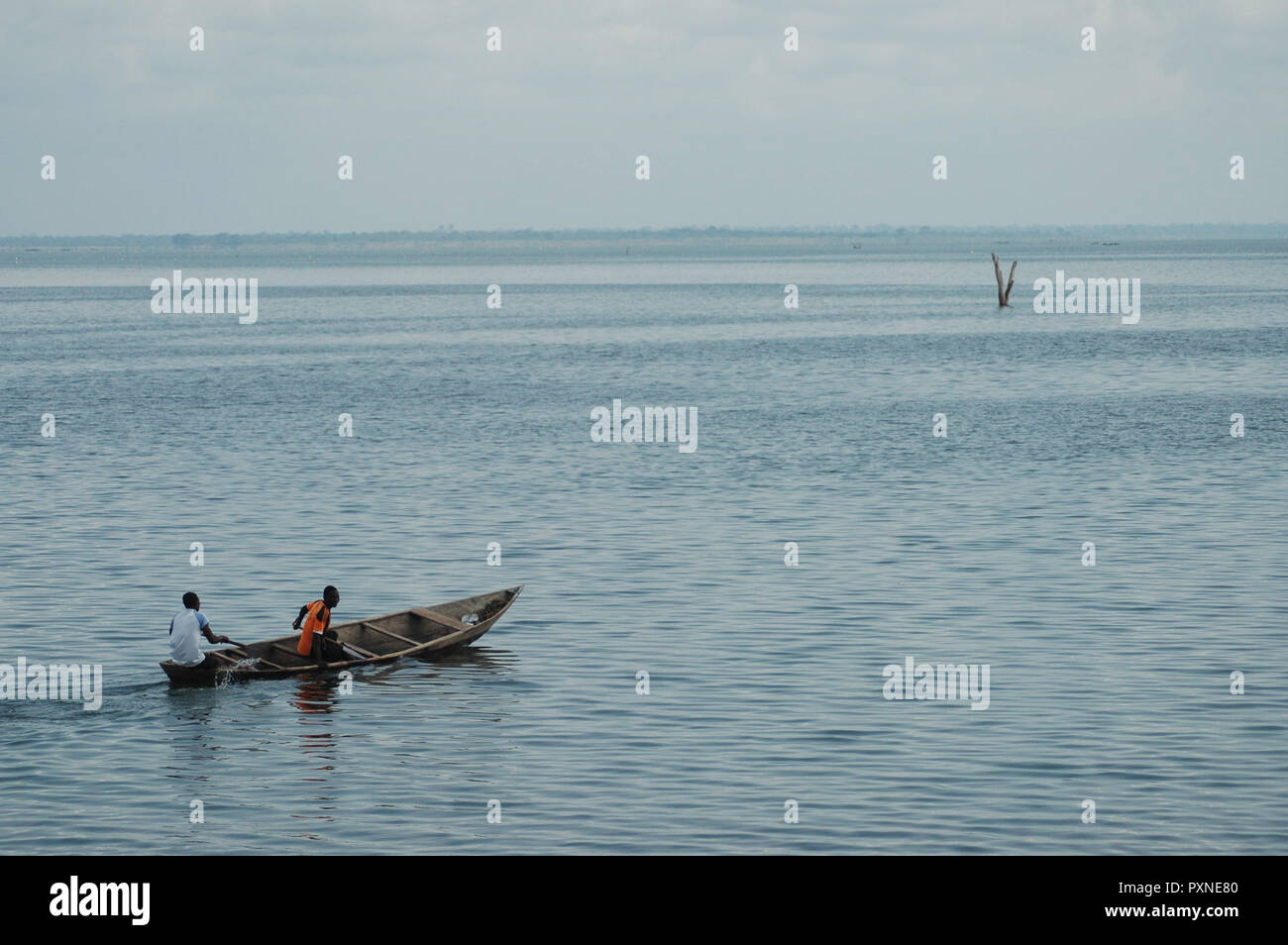 Donkorkrom, Ghana: July 20th 2016 - wooden canoe out on Lake Volta, Ghana Stock Photo