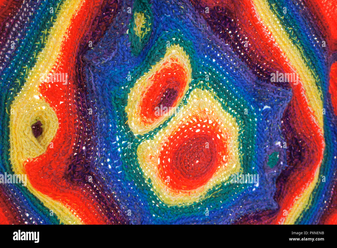 Colourful crocheted wool cloth as a background Stock Photo