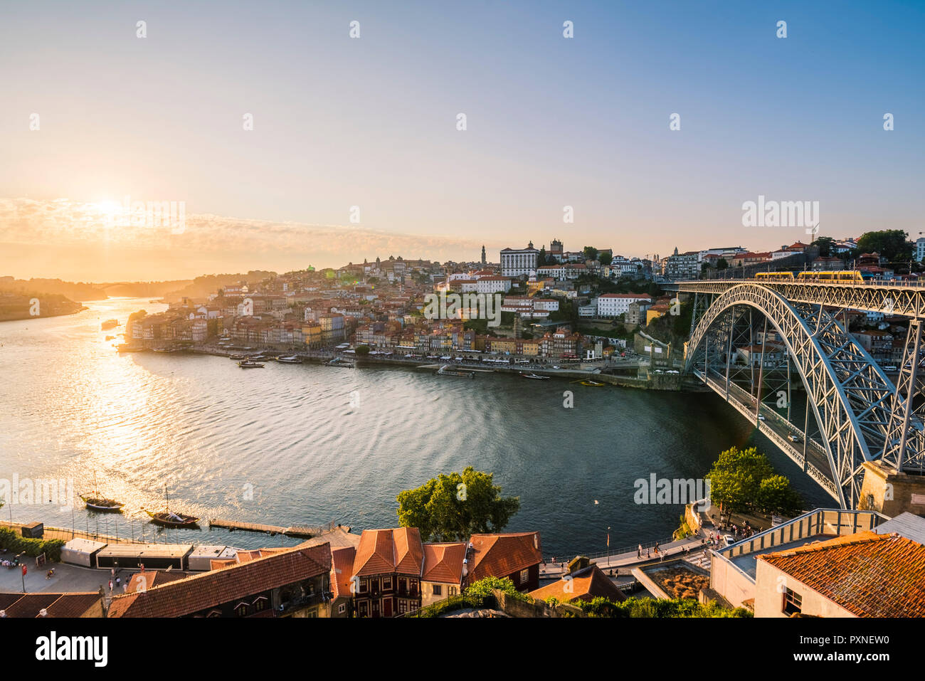 Portugal, Norte region, Porto (Oporto). Dom Luis I bridge and Douro river at sunset. Stock Photo