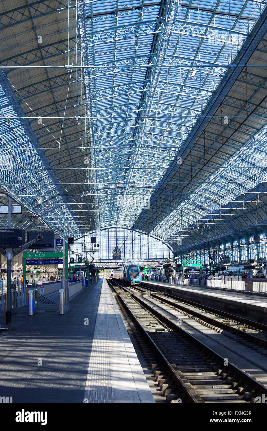 Bordeaux St Jean, one of the great French railway stations, its trainshed built by Gustave Eiffel in 1898, and has recently been repainted powder blue Stock Photo