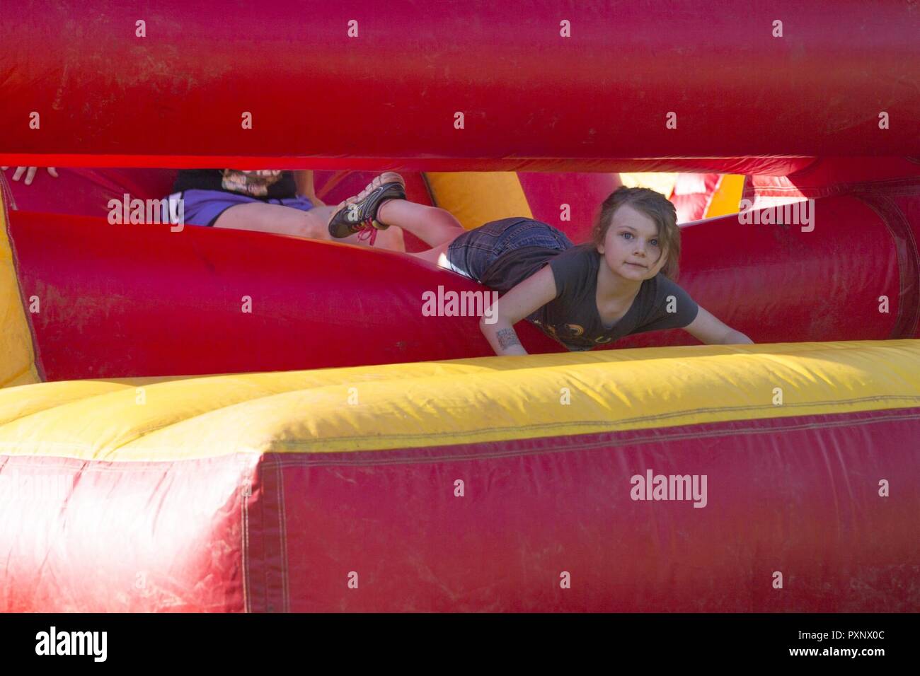 A participant engages an obstacle during the annual Marine Corps