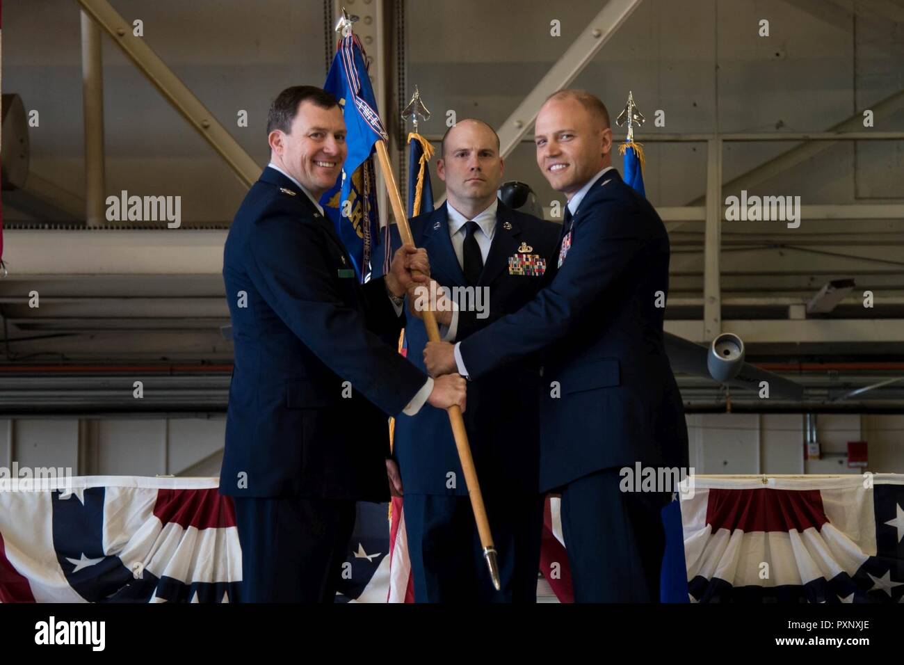 Col. Todd Cargle, 92nd Operations Group commander, passes the 92nd Air ...